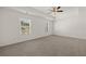 Spacious bedroom with carpet and ceiling fan at 145 Bonito Trl, Covington, GA 30016