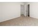 Empty bedroom with closet and carpet at 145 Bonito Trl, Covington, GA 30016