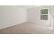 Simple bedroom with window and carpet at 145 Bonito Trl, Covington, GA 30016