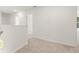 Upstairs hallway with carpet and doors to bedrooms at 145 Bonito Trl, Covington, GA 30016