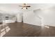 Open concept kitchen with island and hardwood floors at 145 Bonito Trl, Covington, GA 30016