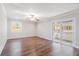 Spacious living room featuring hardwood floors and sliding glass doors at 2307 Cresta Dr, Decatur, GA 30032