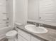Clean bathroom with white vanity and tub at 120 Bonito Trl, Covington, GA 30016