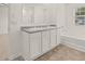 Bathroom with double vanity and a bathtub at 120 Bonito Trl, Covington, GA 30016