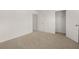 Bright bedroom with closet and window at 120 Bonito Trl, Covington, GA 30016