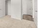 Bedroom with carpet, closet, and access to hallway at 120 Bonito Trl, Covington, GA 30016