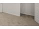 Empty bedroom with carpet flooring and closet at 120 Bonito Trl, Covington, GA 30016