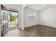 Open front entry with view of yard and hardwood floors at 120 Bonito Trl, Covington, GA 30016