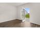 Living room with patio access and hardwood floors at 120 Bonito Trl, Covington, GA 30016