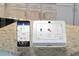 Smart home system with touchscreen and mobile app at 120 Bonito Trl, Covington, GA 30016