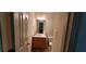 Small bathroom with sink and toilet at 1771 Fielding Way, Hampton, GA 30228