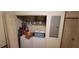 Functional laundry room with shelving at 1771 Fielding Way, Hampton, GA 30228