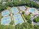 Aerial view of community tennis courts and pool at 215 Southern Hill Dr, Johns Creek, GA 30097