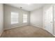 Bright bedroom featuring neutral walls and carpet at 7250 Weber St, Atlanta, GA 30349