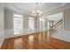 Formal dining room with hardwood floors and wainscoting at 7250 Weber St, Atlanta, GA 30349