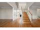Bright and spacious two story foyer with hardwood floors and staircase at 7250 Weber St, Atlanta, GA 30349