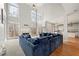 Two story Gathering room with hardwood floors, fireplace and large windows at 7250 Weber St, Atlanta, GA 30349