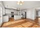 Kitchen features granite countertops, stainless steel appliances, and hardwood floors at 7250 Weber St, Atlanta, GA 30349