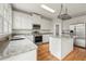 Kitchen with granite countertops, stainless steel appliances, and an island at 7250 Weber St, Atlanta, GA 30349