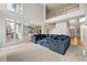 Spacious living room featuring a large sectional sofa and high ceilings at 7250 Weber St, Atlanta, GA 30349