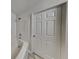 Simple bathroom with a bathtub and good storage at 4146 Shoals Pt, Union City, GA 30291