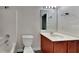 Bathroom with tub, toilet and wood vanity at 4146 Shoals Pt, Union City, GA 30291