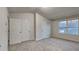 Large bedroom featuring wall-to-wall carpeting and dual closets at 4146 Shoals Pt, Union City, GA 30291