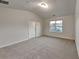 Spacious bedroom with carpeted floor and large window at 4146 Shoals Pt, Union City, GA 30291