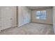 Spacious bedroom with plush carpeting and ample closet space at 4146 Shoals Pt, Union City, GA 30291