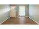 Bright living room with hardwood floors and neutral walls at 3597 Fairlane Nw Dr, Atlanta, GA 30331