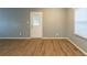 Living room with hardwood floors and access to exterior at 3597 Fairlane Nw Dr, Atlanta, GA 30331