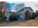 Gray sided house with white steps and landscaping at 4557 Greenleaf Sw Cir, Atlanta, GA 30331