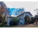Gray sided house with white steps and landscaping at 4557 Greenleaf Sw Cir, Atlanta, GA 30331