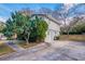 Gray sided house with attached garage and landscaping at 4557 Greenleaf Sw Cir, Atlanta, GA 30331