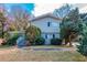 Two story house with gray siding, landscaping, and walkway at 4557 Greenleaf Sw Cir, Atlanta, GA 30331