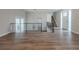 Living area with hardwood floors, staircase and view to backyard at 4557 Greenleaf Sw Cir, Atlanta, GA 30331