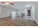 Spacious living room with hardwood floors and access to upper level at 4557 Greenleaf Sw Cir, Atlanta, GA 30331