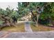 A sidewalk leads through a landscaped yard at 4557 Greenleaf Sw Cir, Atlanta, GA 30331
