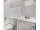 Small bathroom with white tile and vanity at 844 Parkstone Dr, Stone Mountain, GA 30083