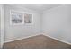 Spacious bedroom with neutral walls and carpet at 844 Parkstone Dr, Stone Mountain, GA 30083