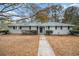 Gray ranch house with walkway and landscaping at 844 Parkstone Dr, Stone Mountain, GA 30083