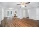 Open living space with hardwood floors and access to kitchen at 844 Parkstone Dr, Stone Mountain, GA 30083