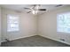 Bedroom with ceiling fan and two windows at 2168 Polar Rock Sw Pl, Atlanta, GA 30315