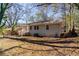 Brick ranch house with a yard, steps, and mature trees at 2168 Polar Rock Sw Pl, Atlanta, GA 30315