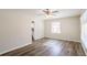 Living room with hardwood floors and access to kitchen at 2168 Polar Rock Sw Pl, Atlanta, GA 30315