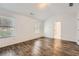 Main bedroom with wood flooring and en-suite bathroom access at 21 Old Country Trl, Dallas, GA 30157