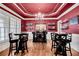 Well-appointed home bar with rich wood finishes at 221 Oakwood Dr, Cumming, GA 30040