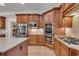 Bright kitchen with stainless steel appliances and lots of counter space at 221 Oakwood Dr, Cumming, GA 30040