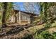 View of a house and storage shed from the backyard at 3166 Cloverhurst Dr, Atlanta, GA 30344