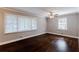 Spacious bedroom with hardwood floors and large window at 3166 Cloverhurst Dr, Atlanta, GA 30344